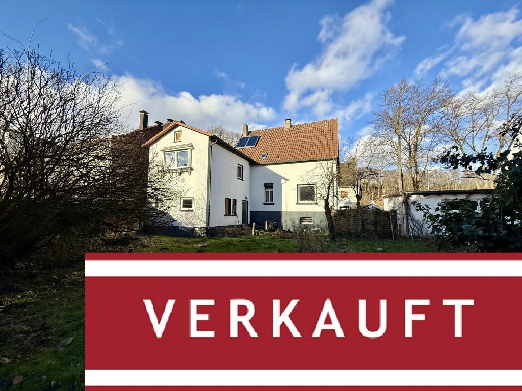 Rückansicht Wohnhaus mit Garten