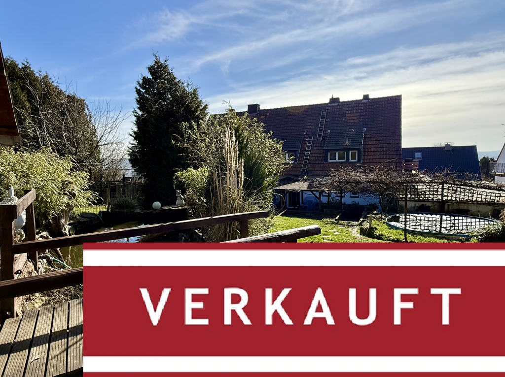 Garten mit Haus-Rückansicht